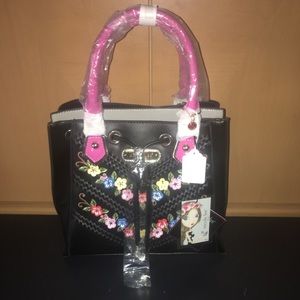 Black and pink with flowers purse